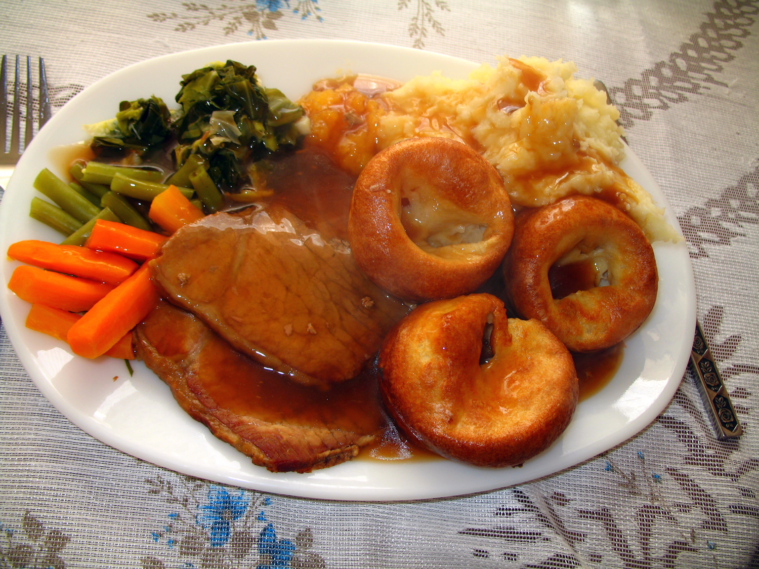 A traditional British Sunday roast — the kind of plate the kitchen runs every week